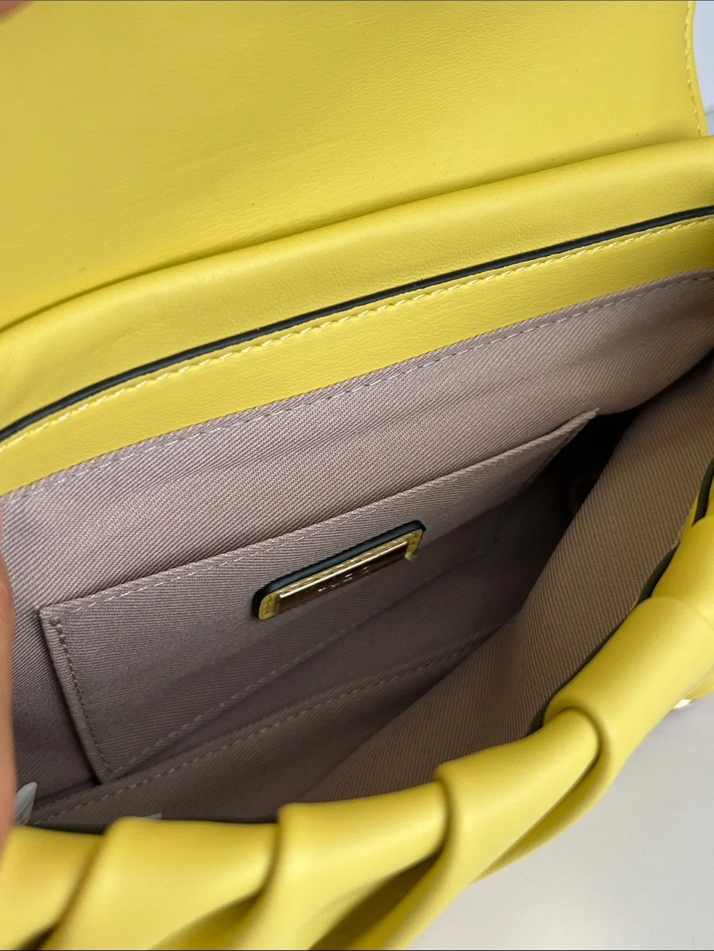 Aldo compact clutch